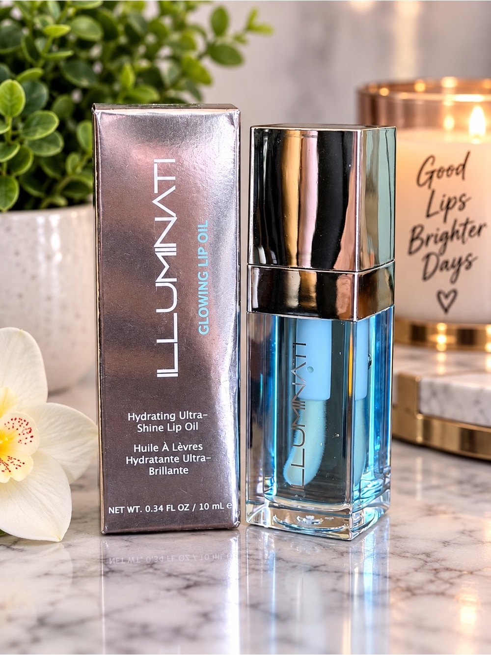 ILLUMINATI Glowing Lip Oil ā Hydrating Blue Lip Gloss